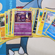 Some Lost Origin Pokemon cards on a Snorlax playmat.